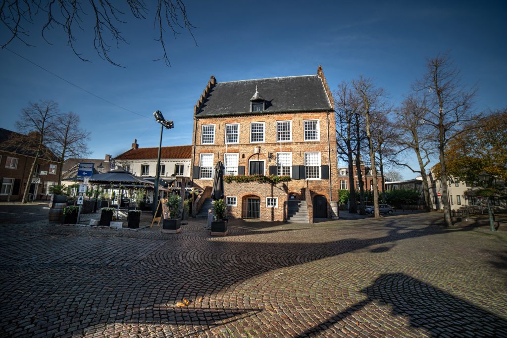 The Market Square of Oirschot with terraces and monumental buildings